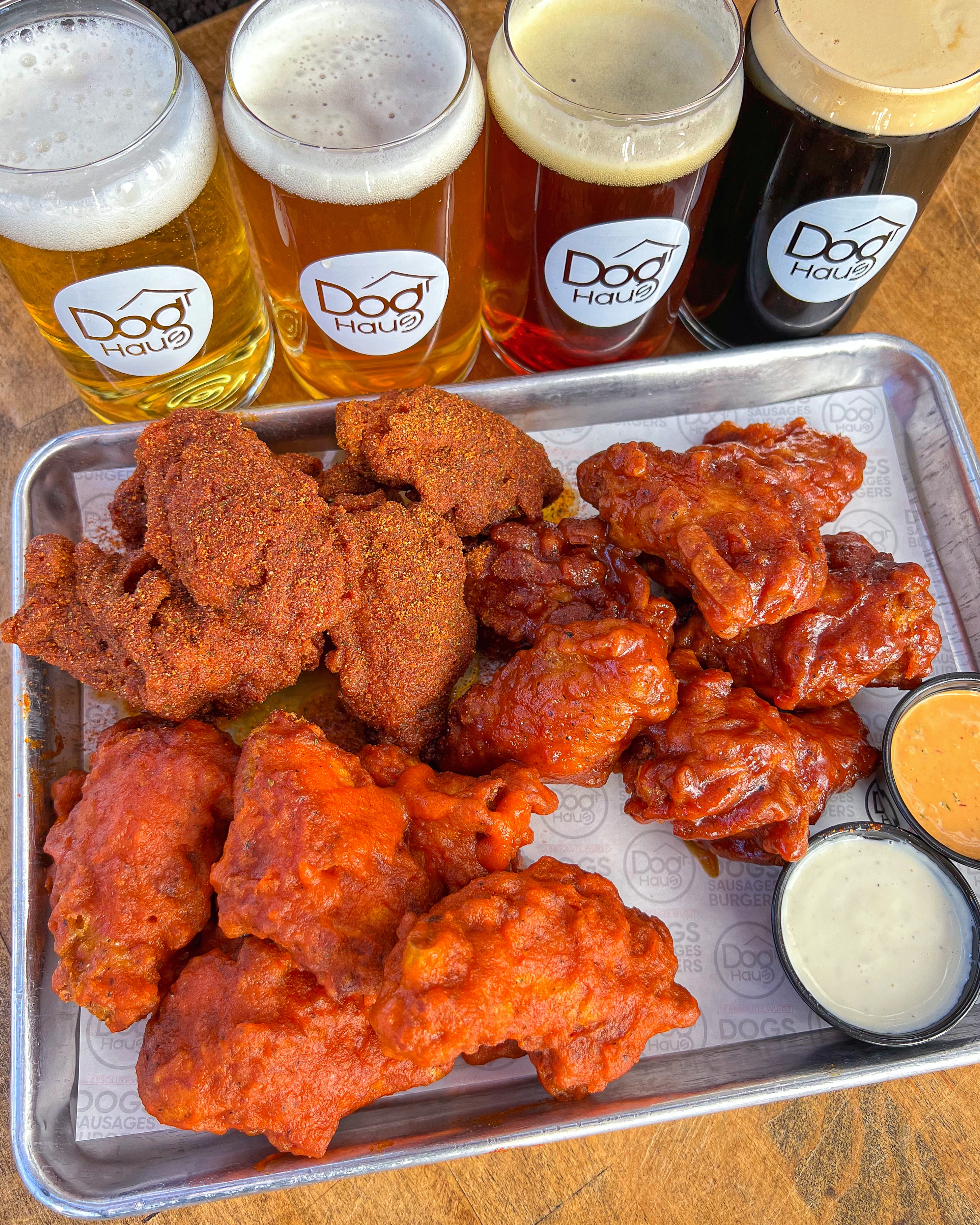 Craft beer and biergarten patio at Dog Haus Chandler during happy hour